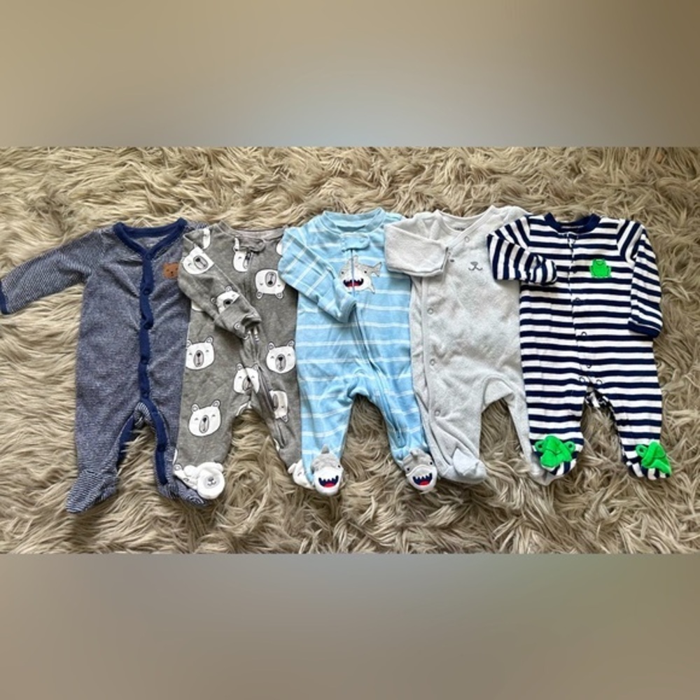 Carter’s 4‎ pack of footed Pj’s Size NB